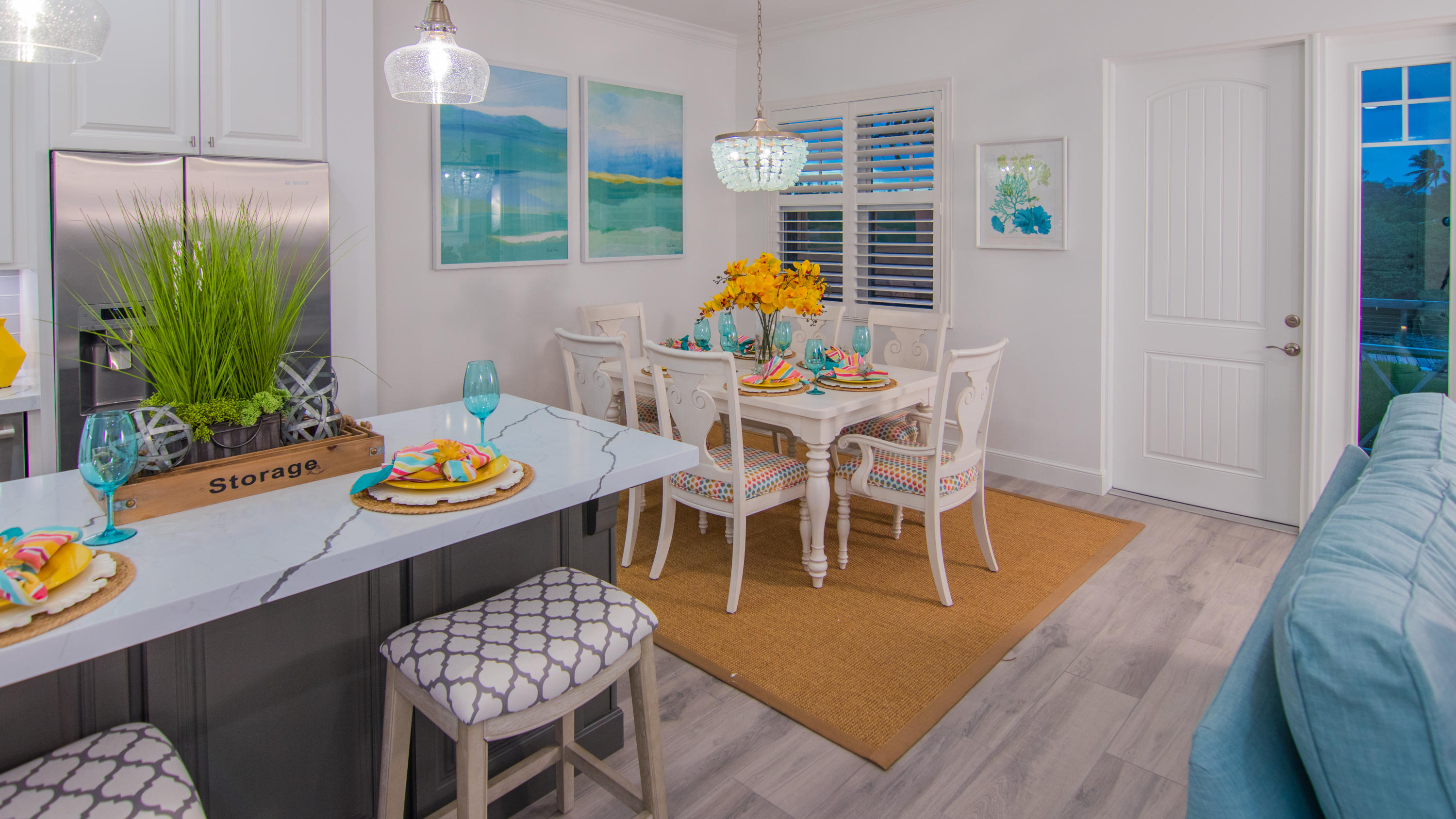 203 Inlet Waters Circle Jupiter, FL 33477 - Photo 2 of 12 a view of a dining room with furniture and wooden floor