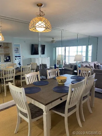 a view of a dining room with furniture