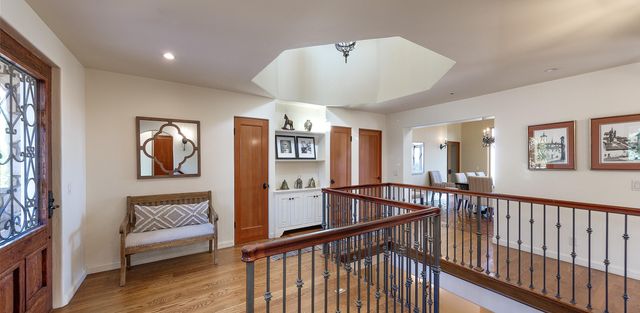 a view of a hallway with a bedroom