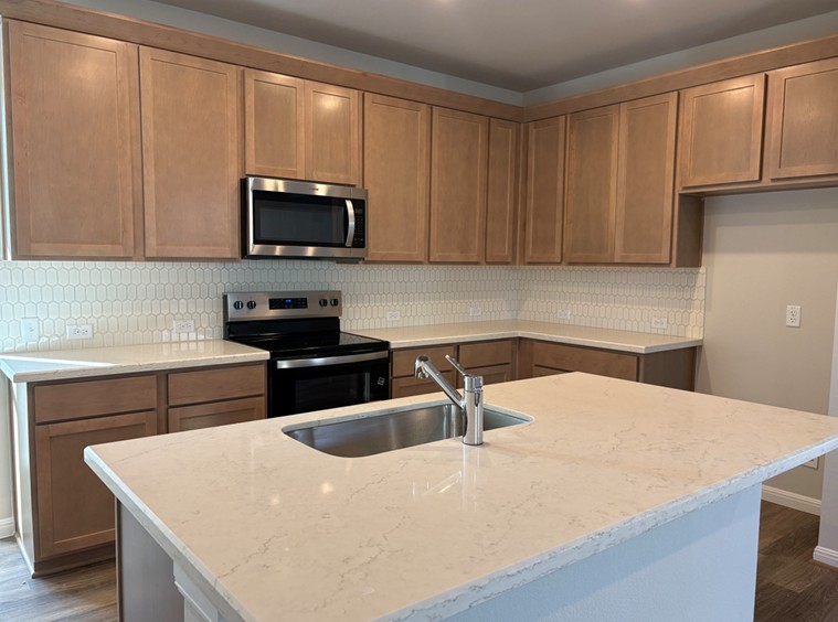 111 Elm Br Trail Taylor, TX 76574 - Photo 3 of 26 Light & Bright Open Concept Kitchen