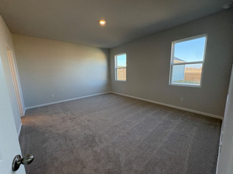 111 Elm Br Trail Taylor, TX 76574 - Photo 9 of 26 Primary Bedroom