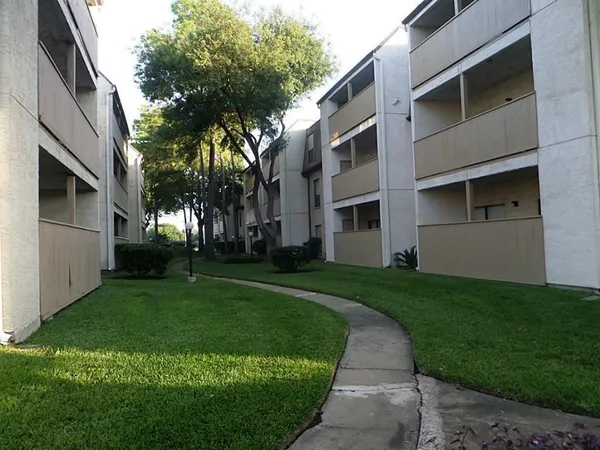 a view of a back yard of the house