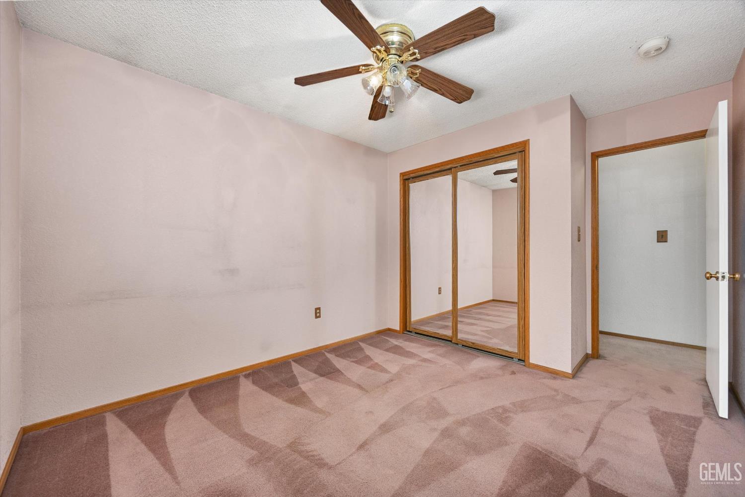 Undisclosed Address Bakersfield, CA 93307 - Photo 20 of 26 a view of a room with a ceiling fan