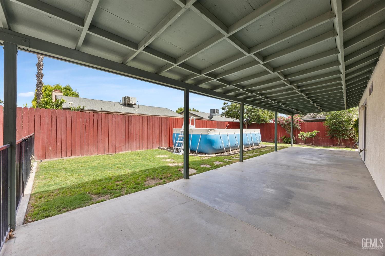 Undisclosed Address Bakersfield, CA 93307 - Photo 24 of 26 a view of a backyard of the house