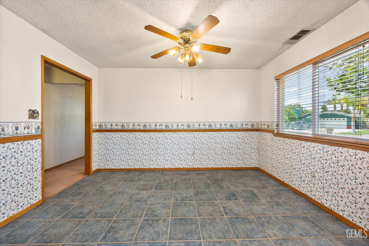 Undisclosed Address Bakersfield, CA 93307 - Photo 7 of 26 a view of an empty room