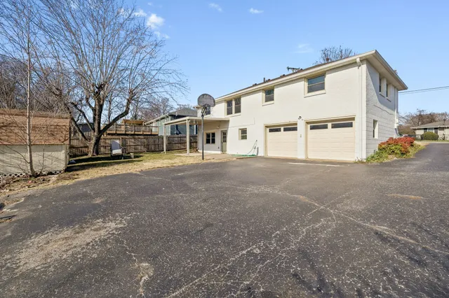 a view of a house with a street