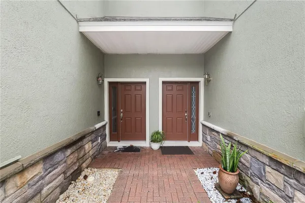 a view of entryway with wooden floor