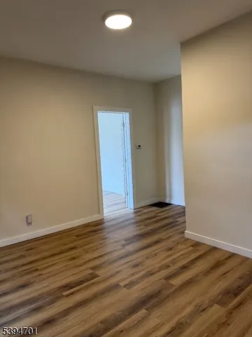 a view of wooden floor and staircase
