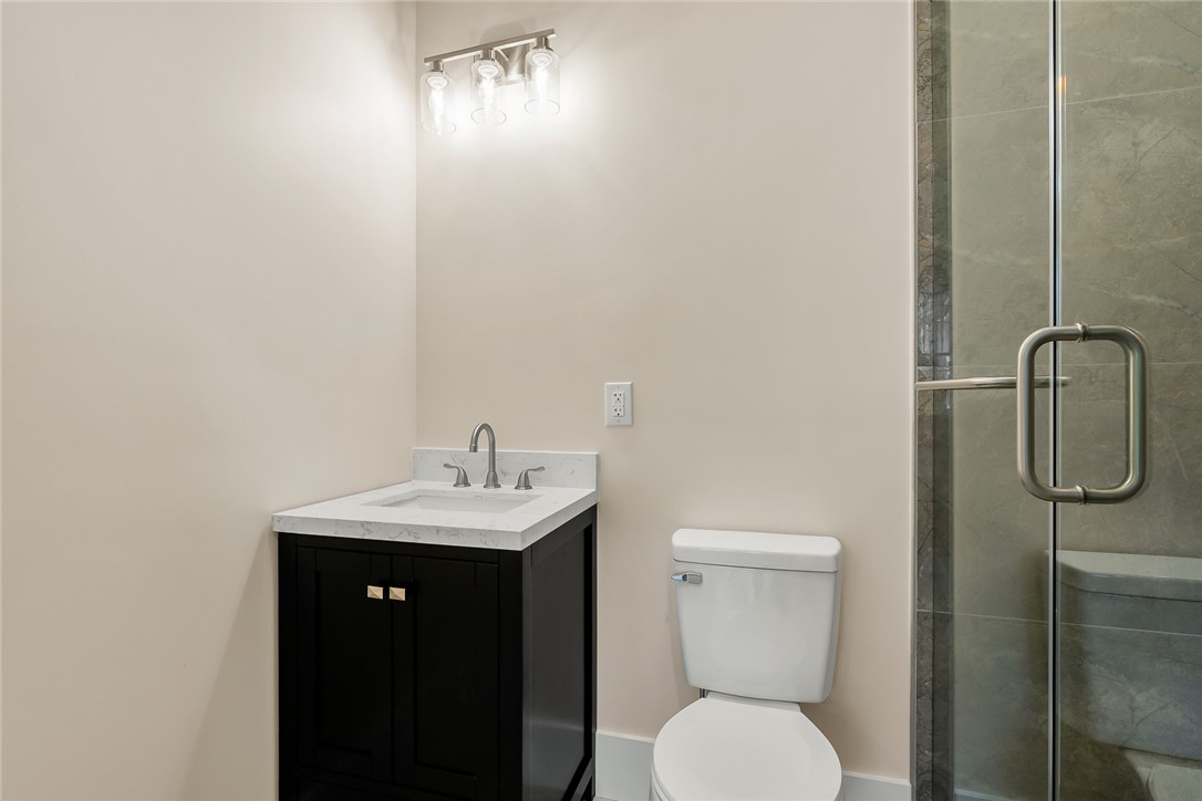 303 Regency Circle Anderson, SC 29625 - Photo 34 of 50 This sleek bathroom features contemporary fixtures, a practical vanity, and a refreshing shower.