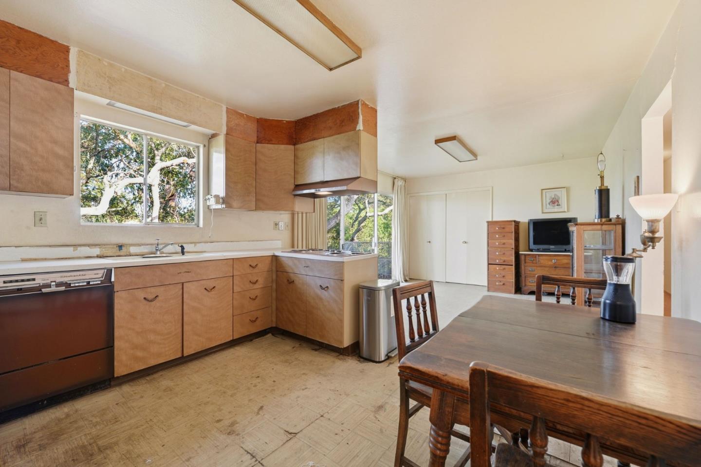 3915 Kingridge Drive San Mateo, CA 94403 - Photo 14 of 47 a kitchen with sink cabinets and window