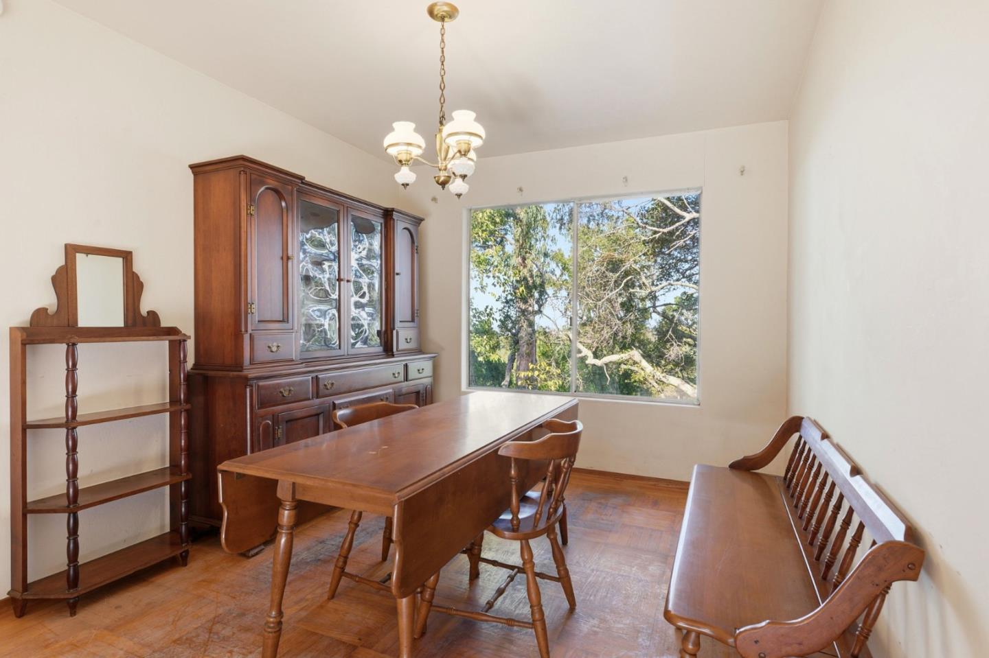 3915 Kingridge Drive San Mateo, CA 94403 - Photo 17 of 47 a dining room with furniture a chandelier and window