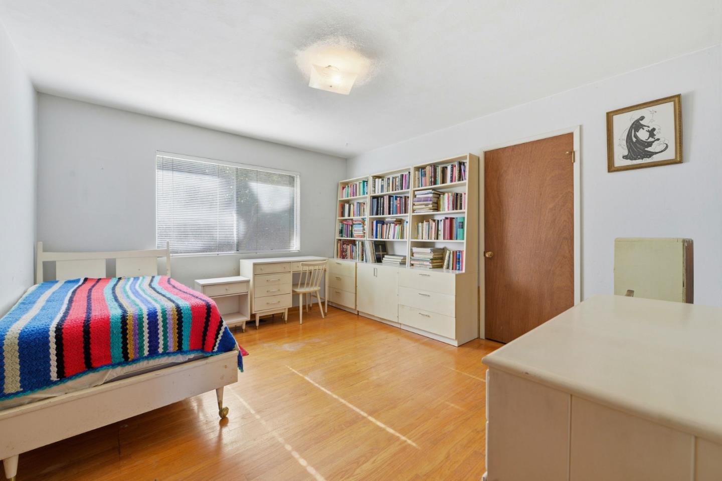 3915 Kingridge Drive San Mateo, CA 94403 - Photo 22 of 47 a bedroom with a bed and a window