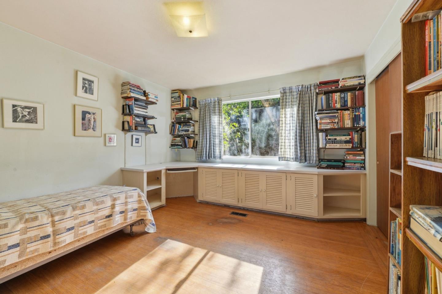 3915 Kingridge Drive San Mateo, CA 94403 - Photo 24 of 47 a bedroom with furniture and window