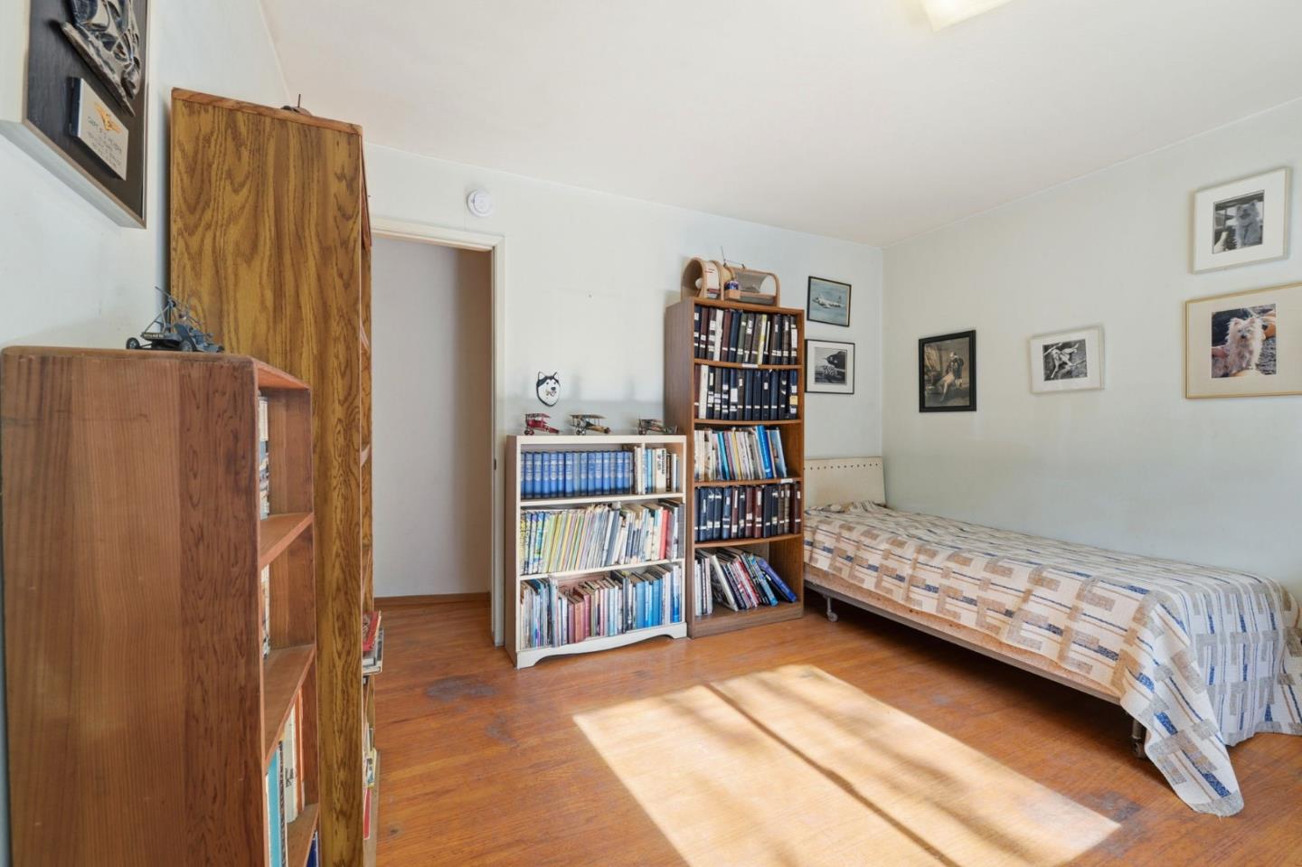3915 Kingridge Drive San Mateo, CA 94403 - Photo 25 of 47 a bedroom with furniture and book shelf