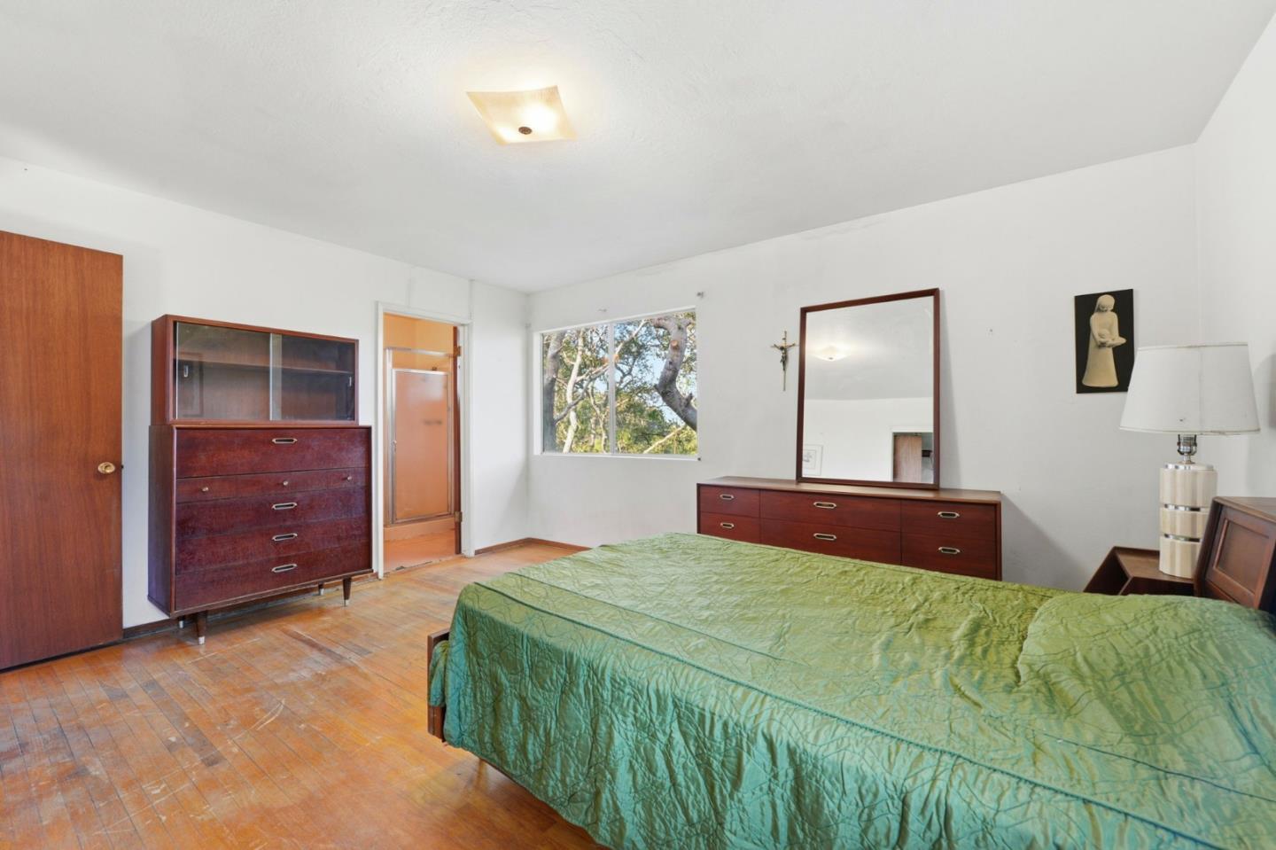 3915 Kingridge Drive San Mateo, CA 94403 - Photo 28 of 47 a bedroom with a bed and a dresser