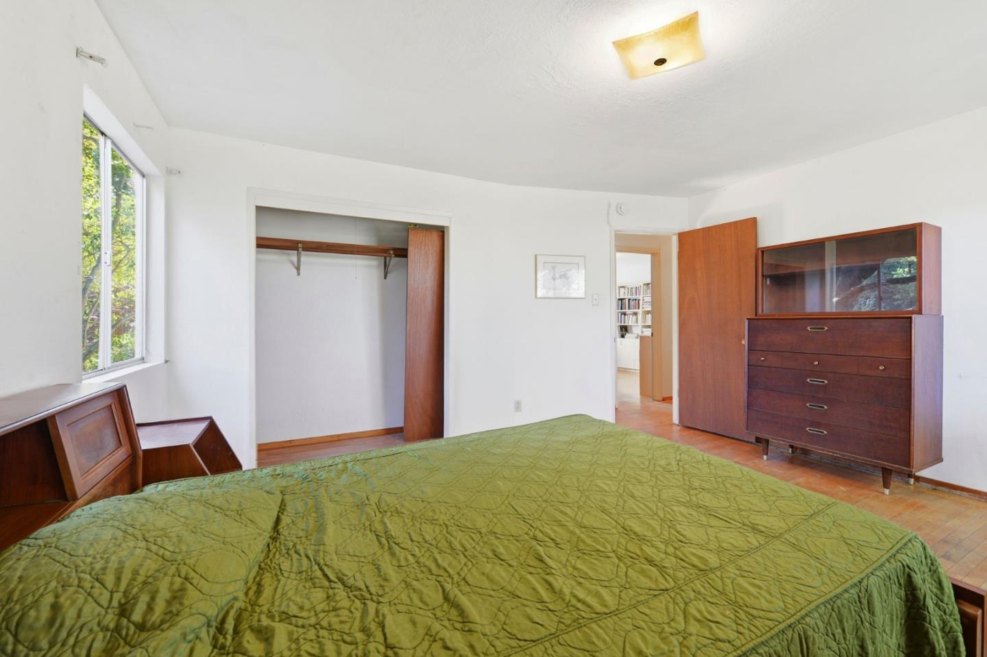 3915 Kingridge Drive San Mateo, CA 94403 - Photo 29 of 47 a bedroom with a bed and a dresser