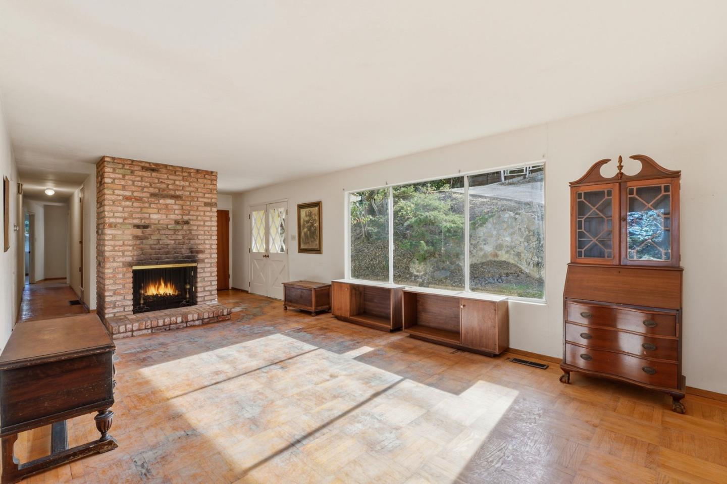 3915 Kingridge Drive San Mateo, CA 94403 - Photo 9 of 47 a living room with furniture and a fireplace