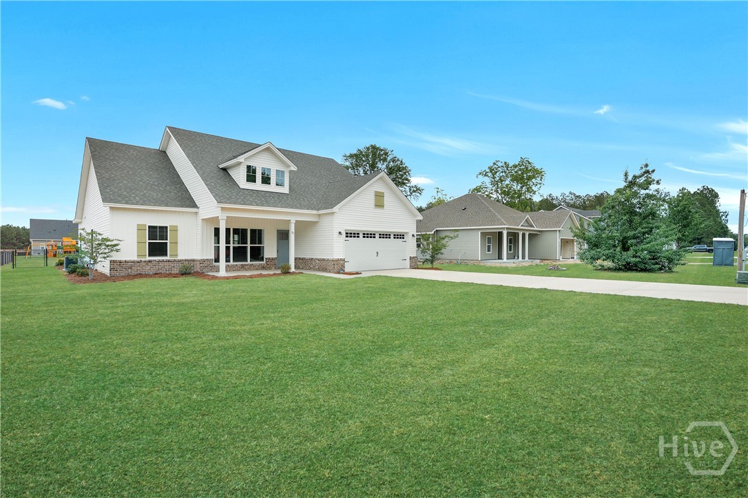 79 Ennis Road Pembroke, GA 31321 - Photo 3 of 41 Grass has been digitally enhanced for marketing purposes.