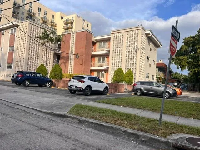a cars parked in front of a house