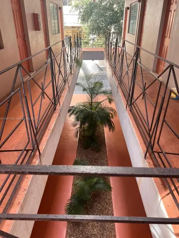 a view of swimming pool with a yard