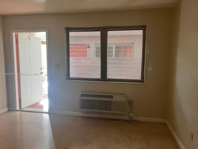 an empty room with a window