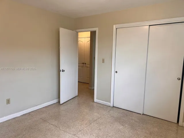 an empty room with closet