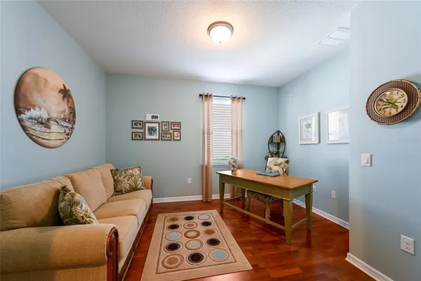 a living room with a couch and a table