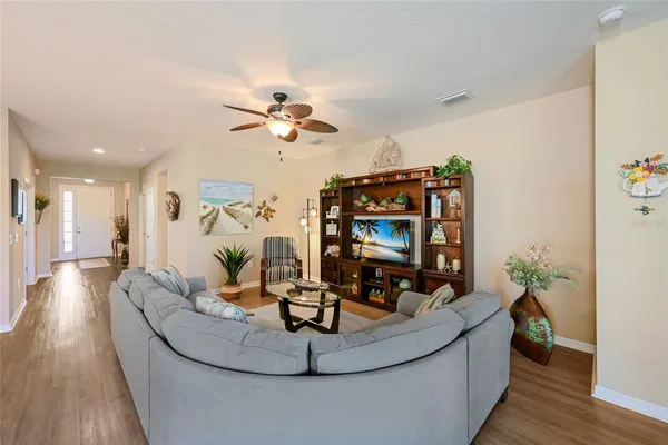 a view of a living room and dining room