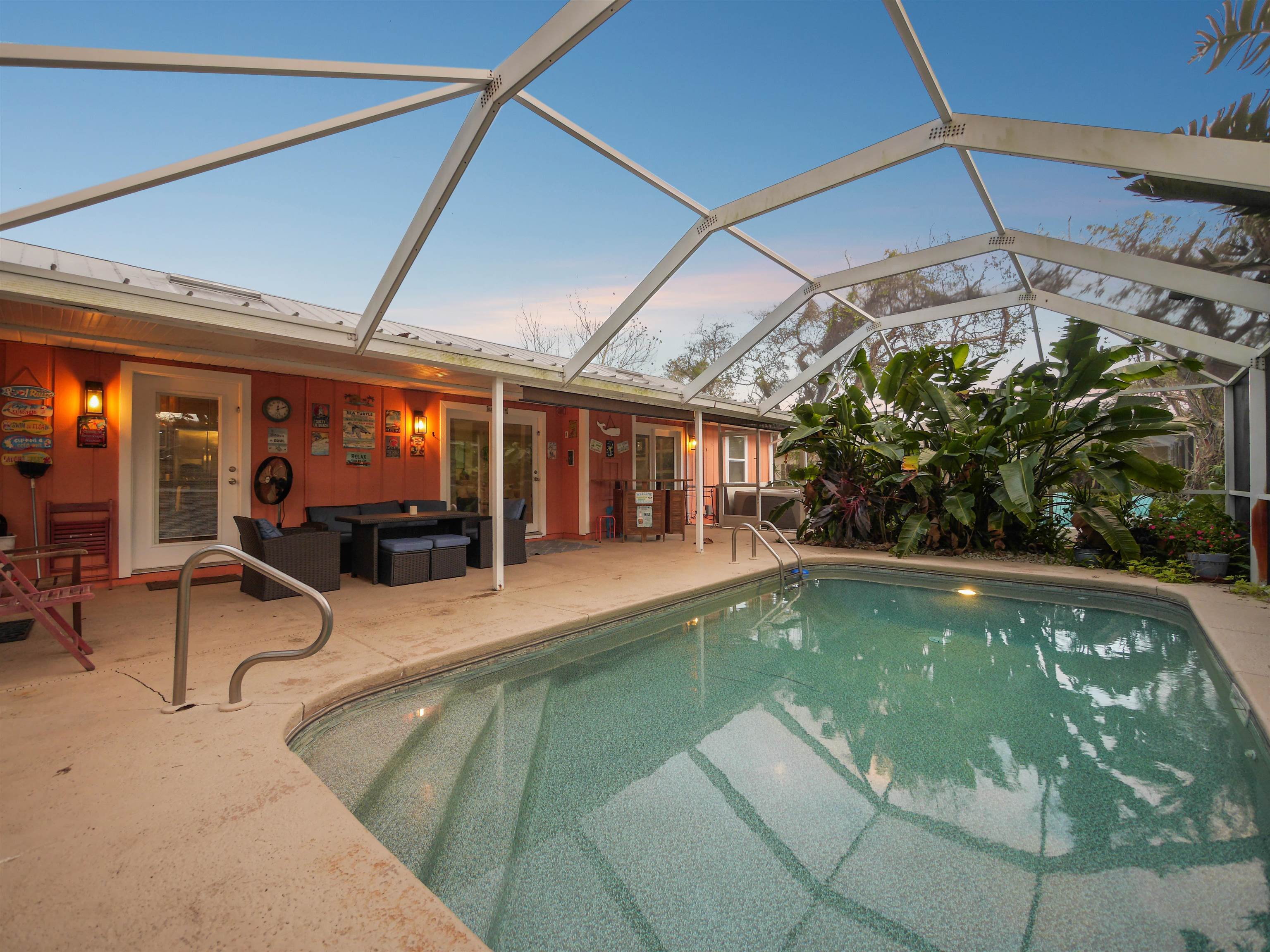 5301 1st Street St. Augustine, FL 32080 - Photo 2 of 36 a view of a swimming pool with a patio