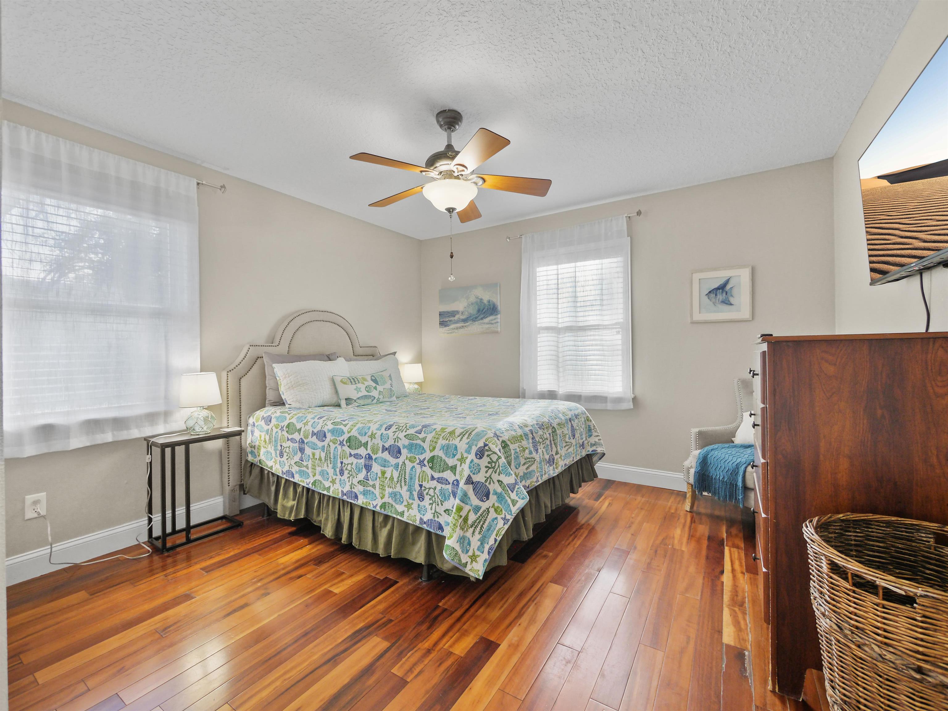5301 1st Street St. Augustine, FL 32080 - Photo 23 of 36 a bedroom with a bed and a window