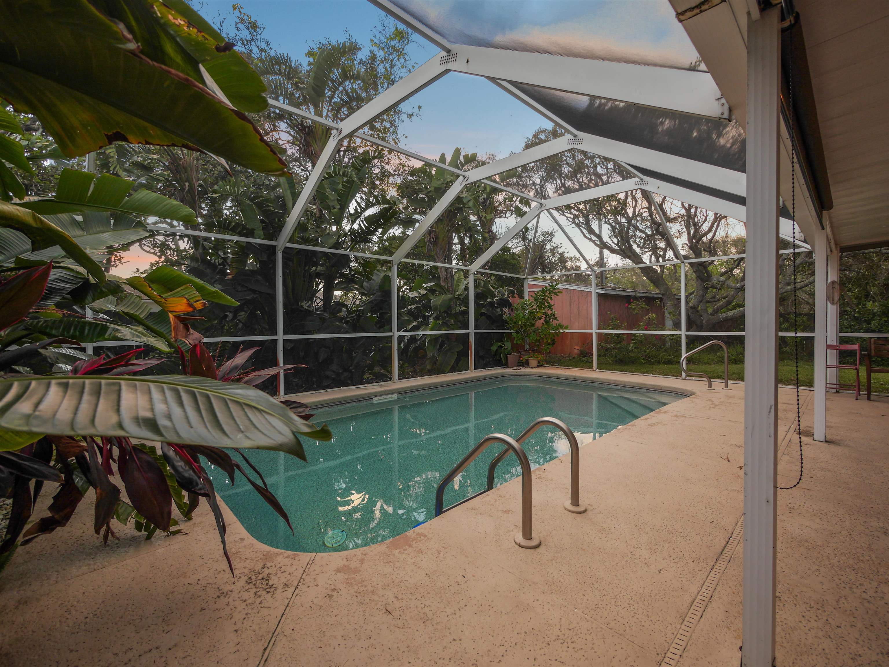 5301 1st Street St. Augustine, FL 32080 - Photo 25 of 36 a view of a swimming pool with a porch