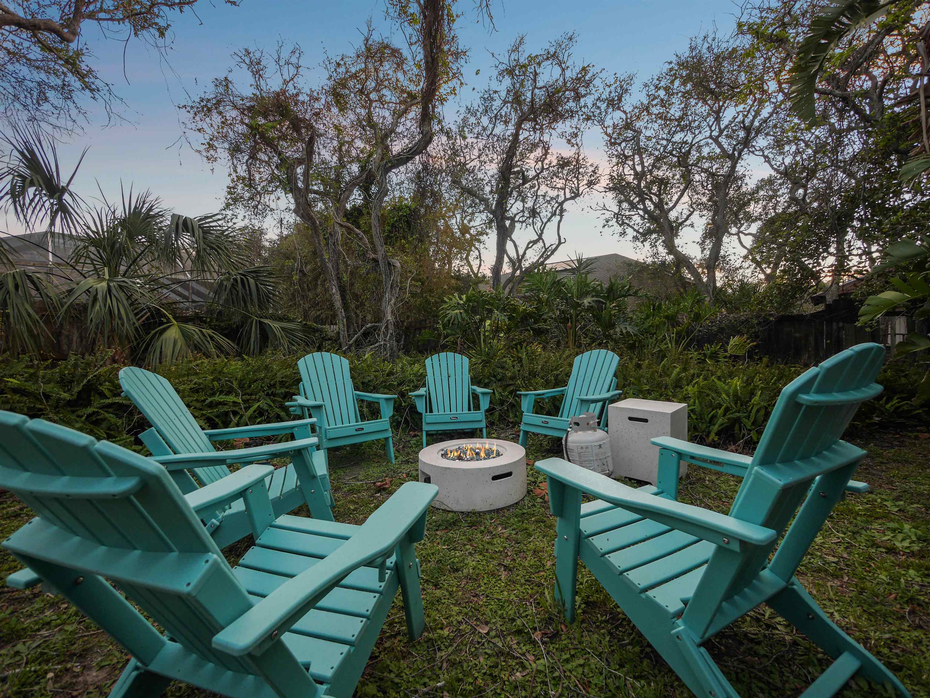 5301 1st Street St. Augustine, FL 32080 - Photo 27 of 36 a view of a chairs and tables in the backyard