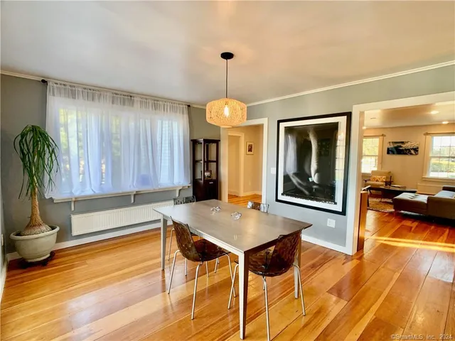 a view of a table and chairs on the roof deck