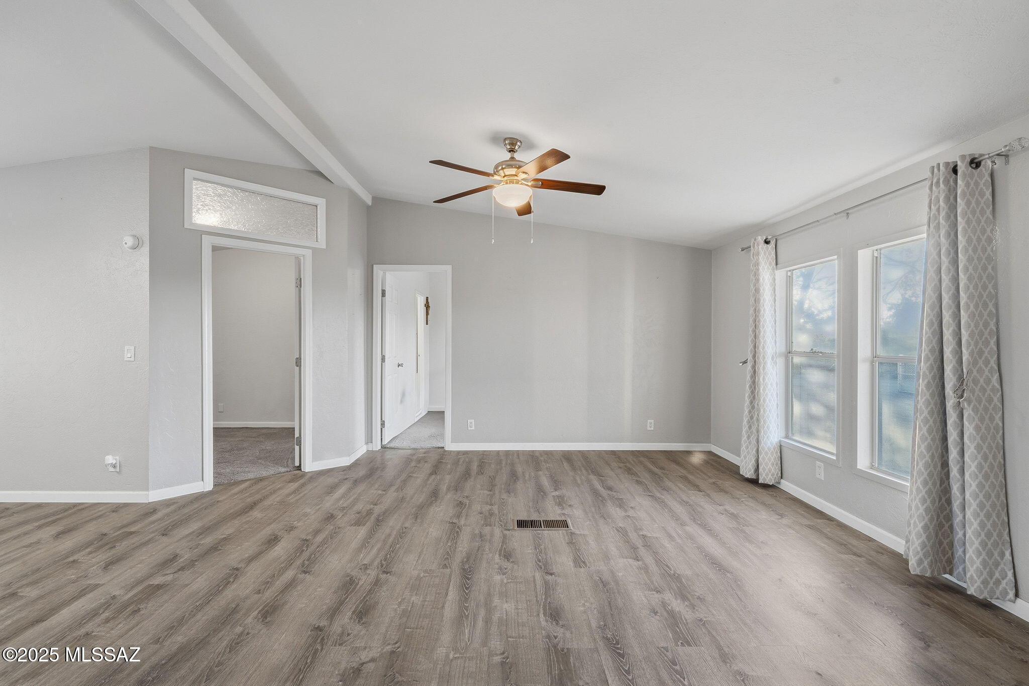 9740 North Running Back Way Marana, AZ 85653 - Photo 7 of 34 Living room looking into Main bedroom & 1st guest bedroom