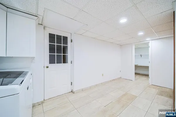 a view of empty room with windows