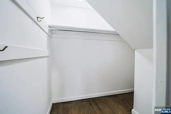 a front view of a house with a yard and porch