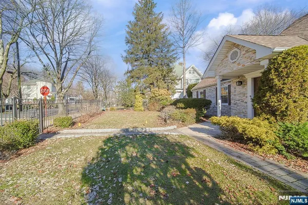 a front view of a house with a outdoor space