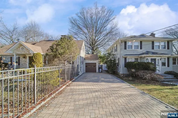 a view of road with large trees