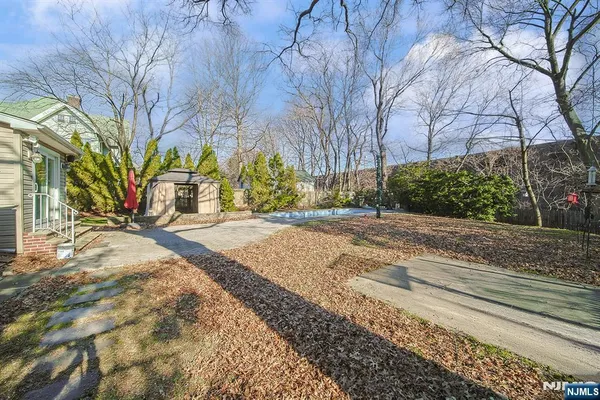a view of swimming pool with outdoor seating