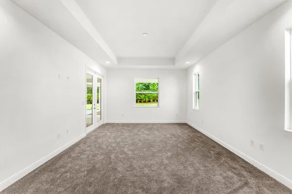 an empty room with windows