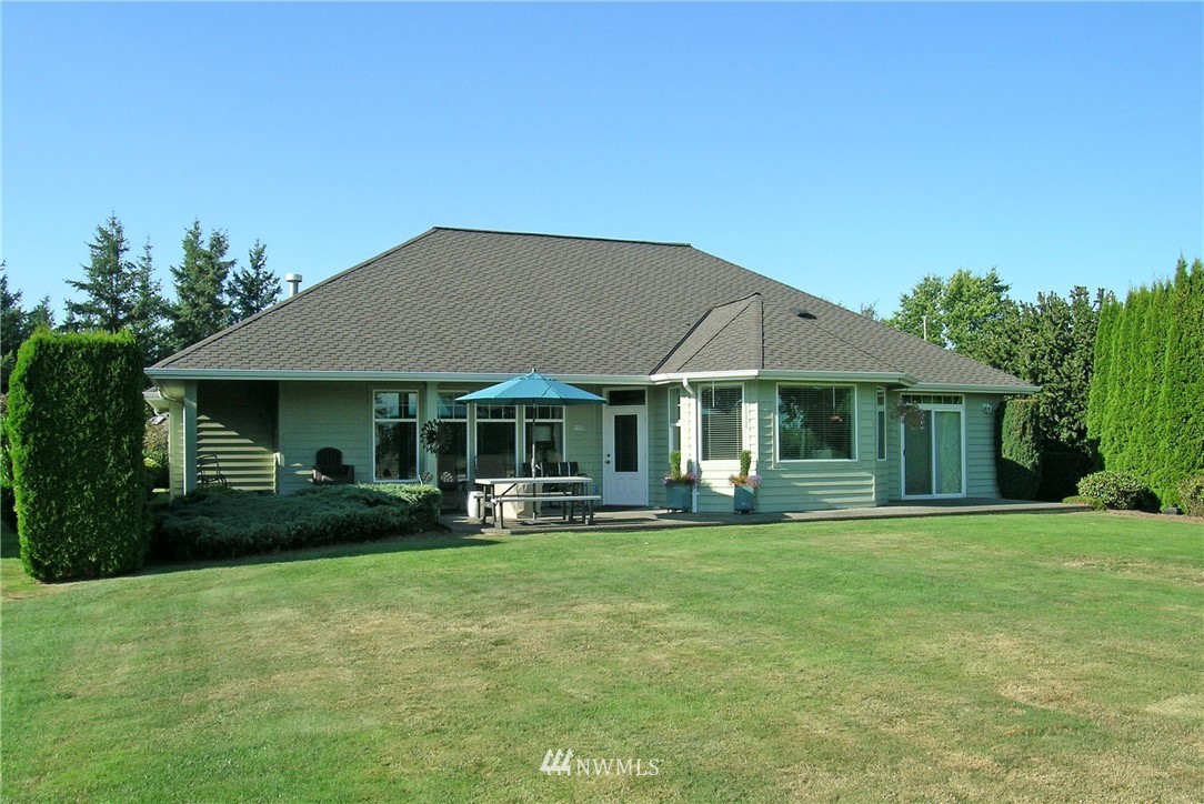 6829 Raspberry Dr. Everson, WA 98247 - Photo 3 of 17 a view of a house with a yard and sitting area