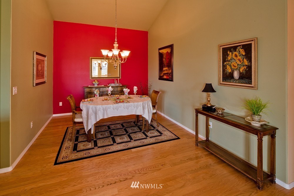 6829 Raspberry Dr. Everson, WA 98247 - Photo 6 of 17 a bedroom with a bed and a dresser with mirror