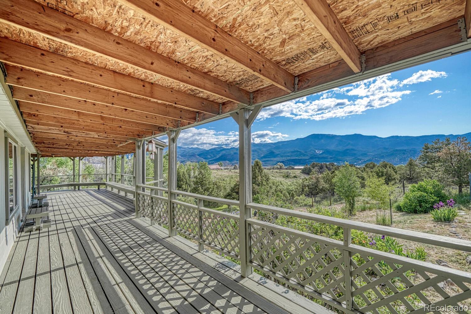 236 Boreen Way Howard, CO 81233 - Photo 12 of 30 a view of a balcony with wooden floor