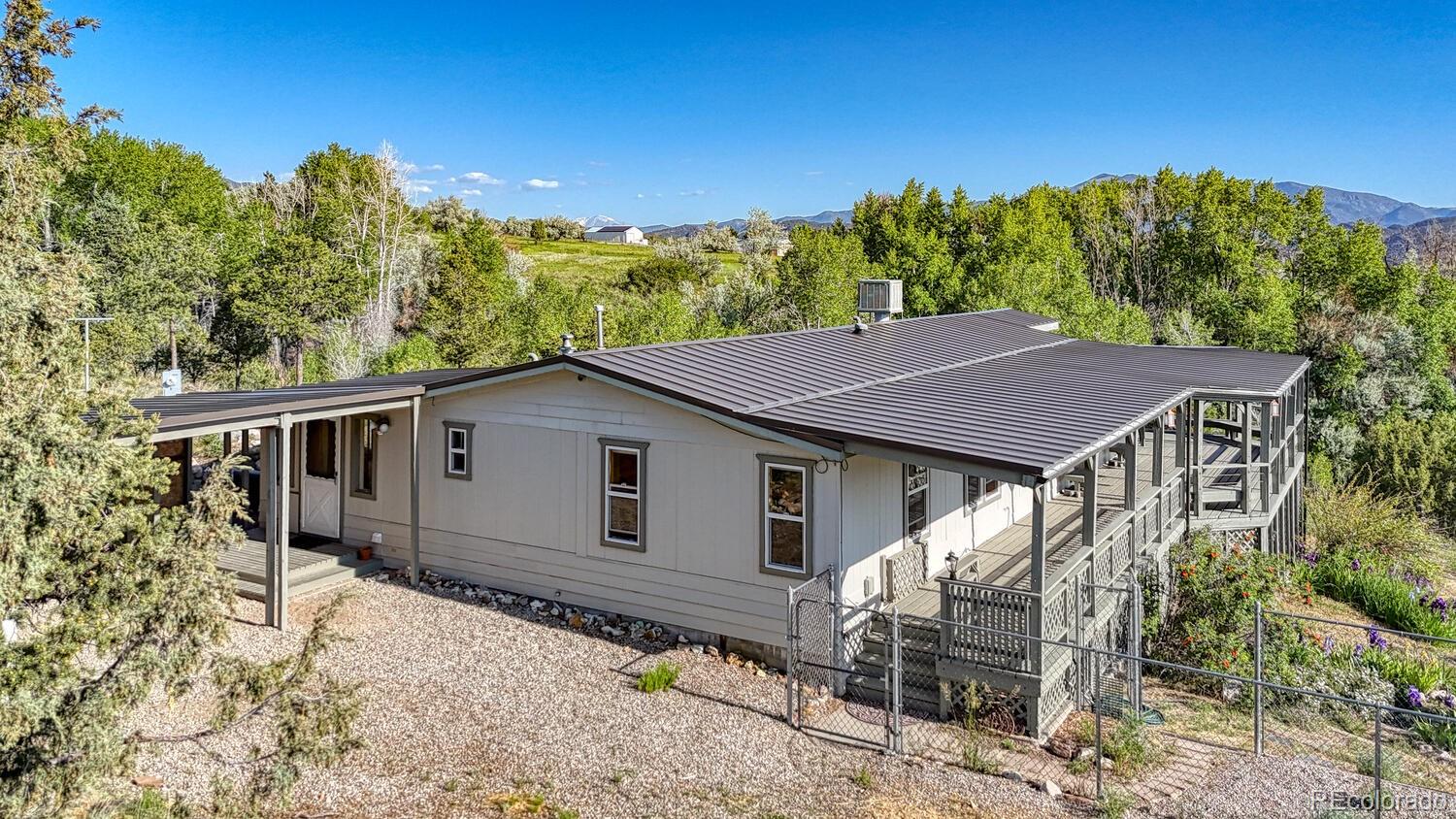 236 Boreen Way Howard, CO 81233 - Photo 3 of 30 a house with trees in the background