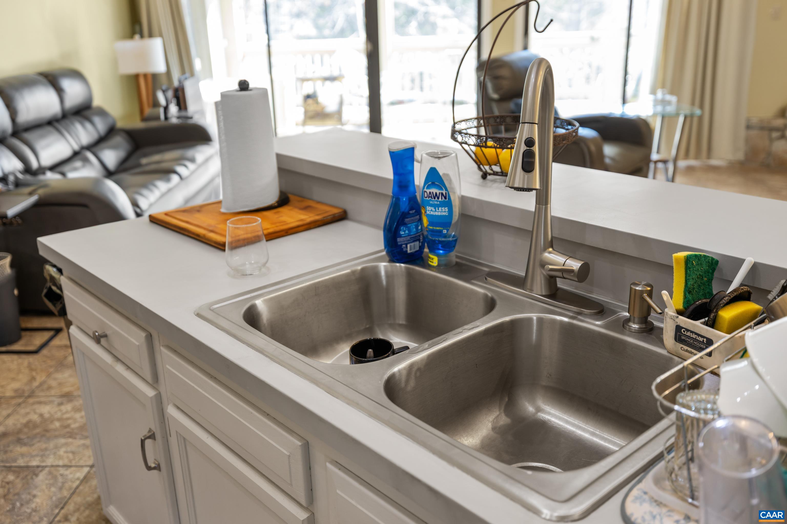 465 Hidden Ridge Road Charlottesville, VA 22902 - Photo 13 of 63 a kitchen with a sink and a stove next to a window