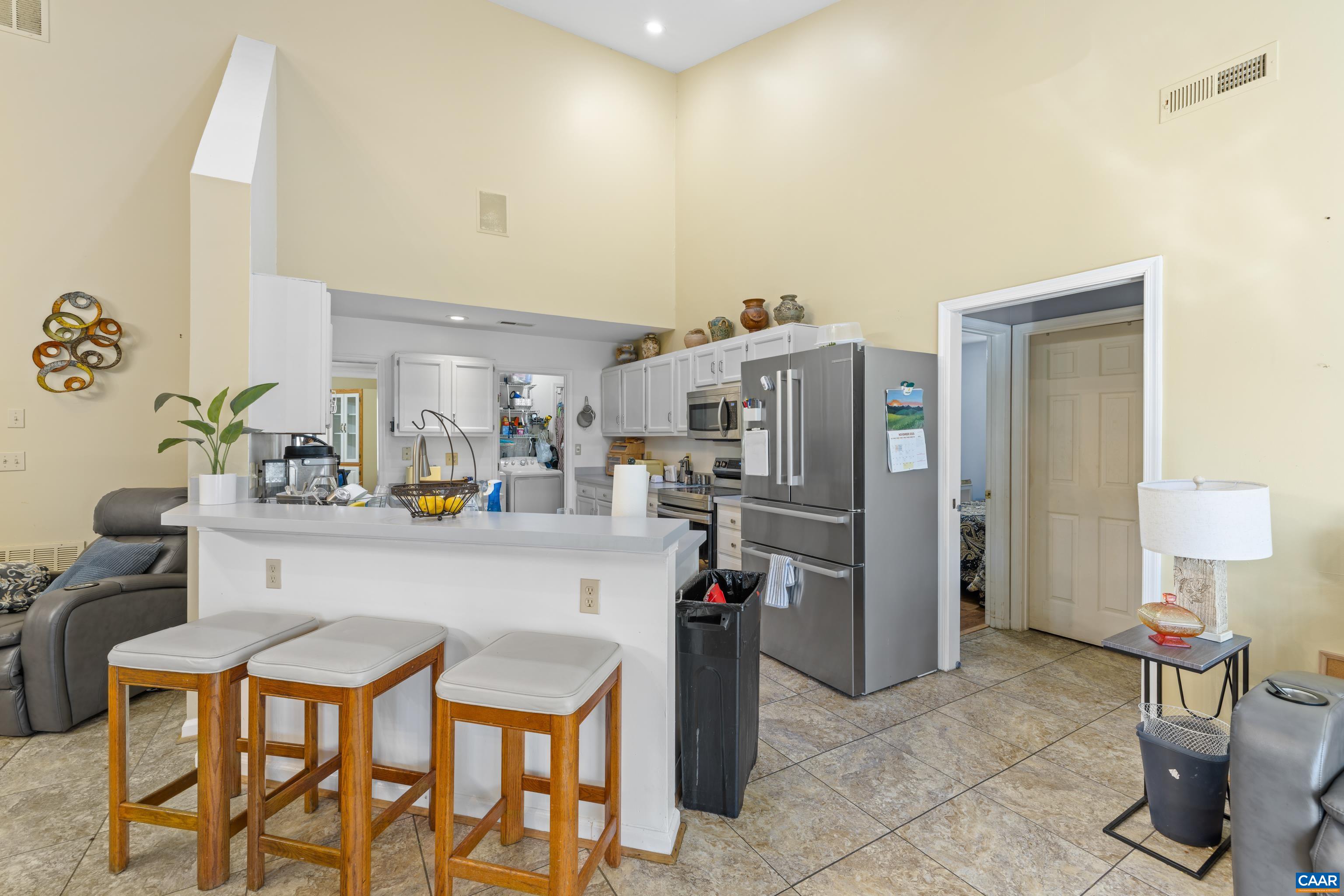 465 Hidden Ridge Road Charlottesville, VA 22902 - Photo 18 of 63 a room with furniture a washer and dryer