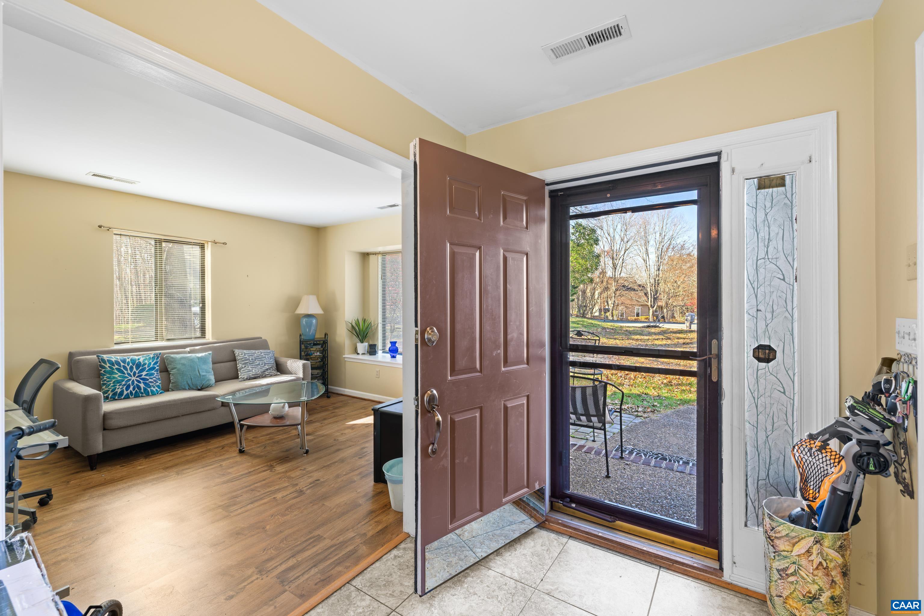 465 Hidden Ridge Road Charlottesville, VA 22902 - Photo 3 of 63 a living room with furniture and a window