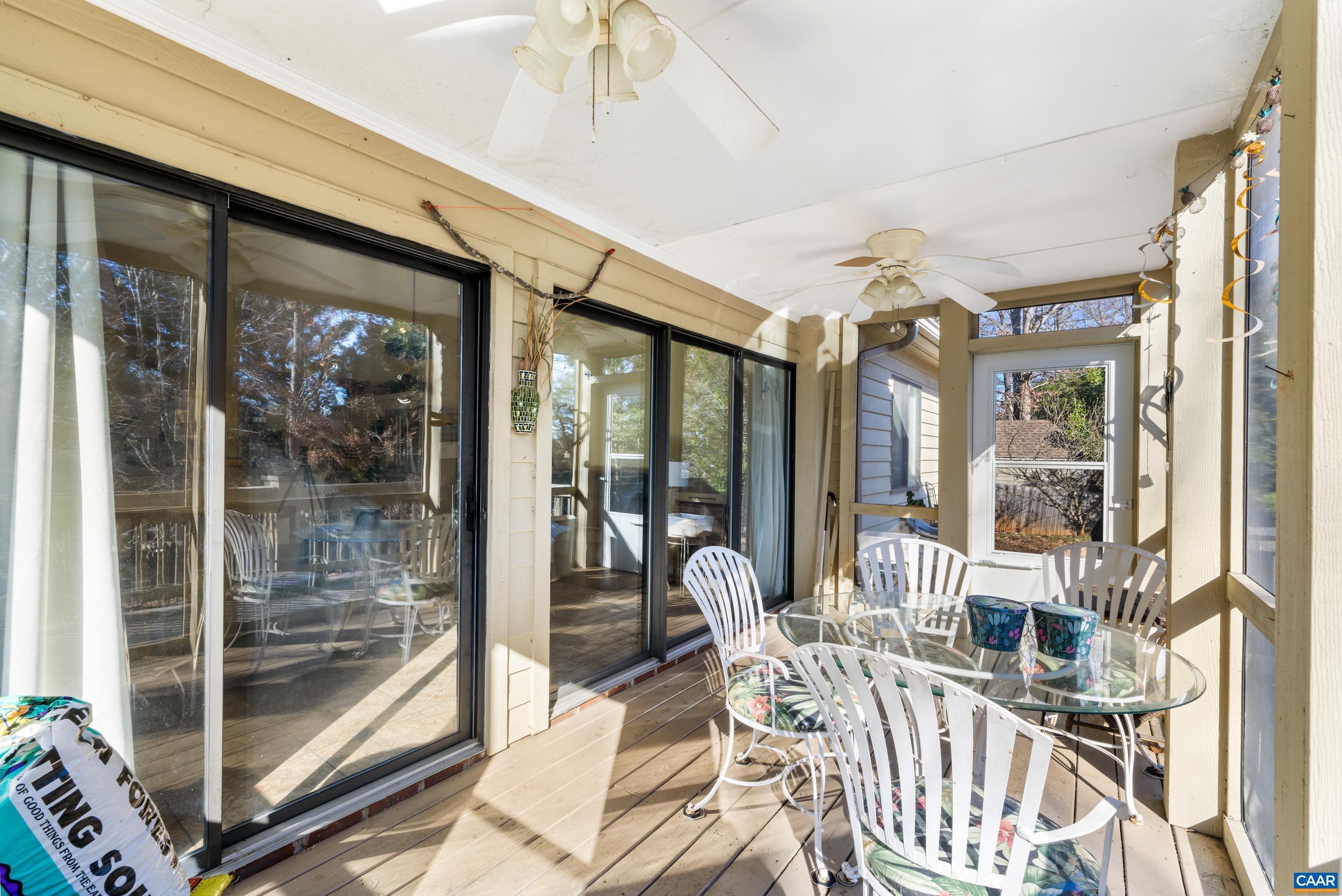 465 Hidden Ridge Road Charlottesville, VA 22902 - Photo 43 of 63 a view of a patio with a table and chairs
