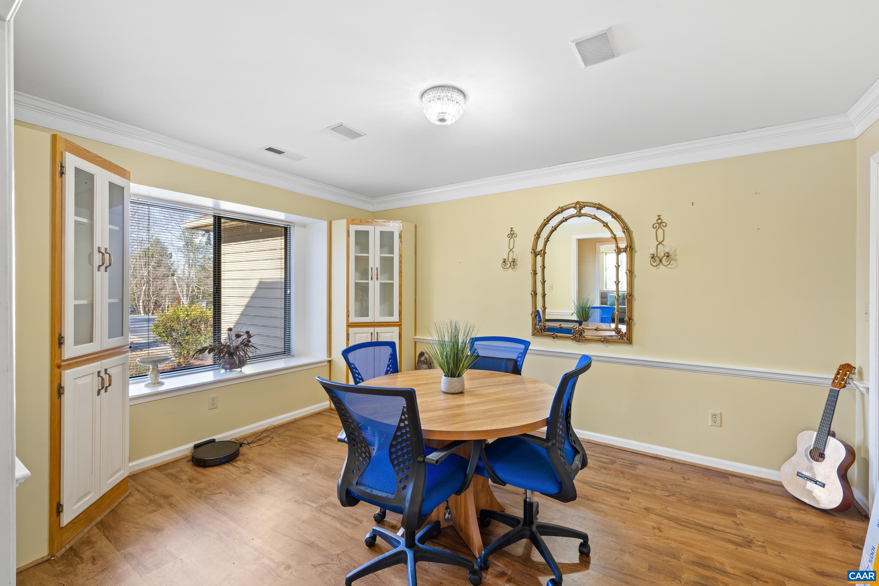 465 Hidden Ridge Road Charlottesville, VA 22902 - Photo 7 of 63 a view of a workspace with furniture and a window