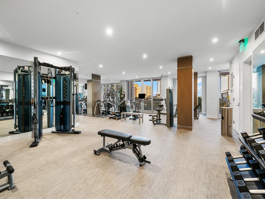 321 North Birch Road, Unit 502 Fort Lauderdale, FL 33304 - Photo 51 of 56 a view of a living room with gym equipment